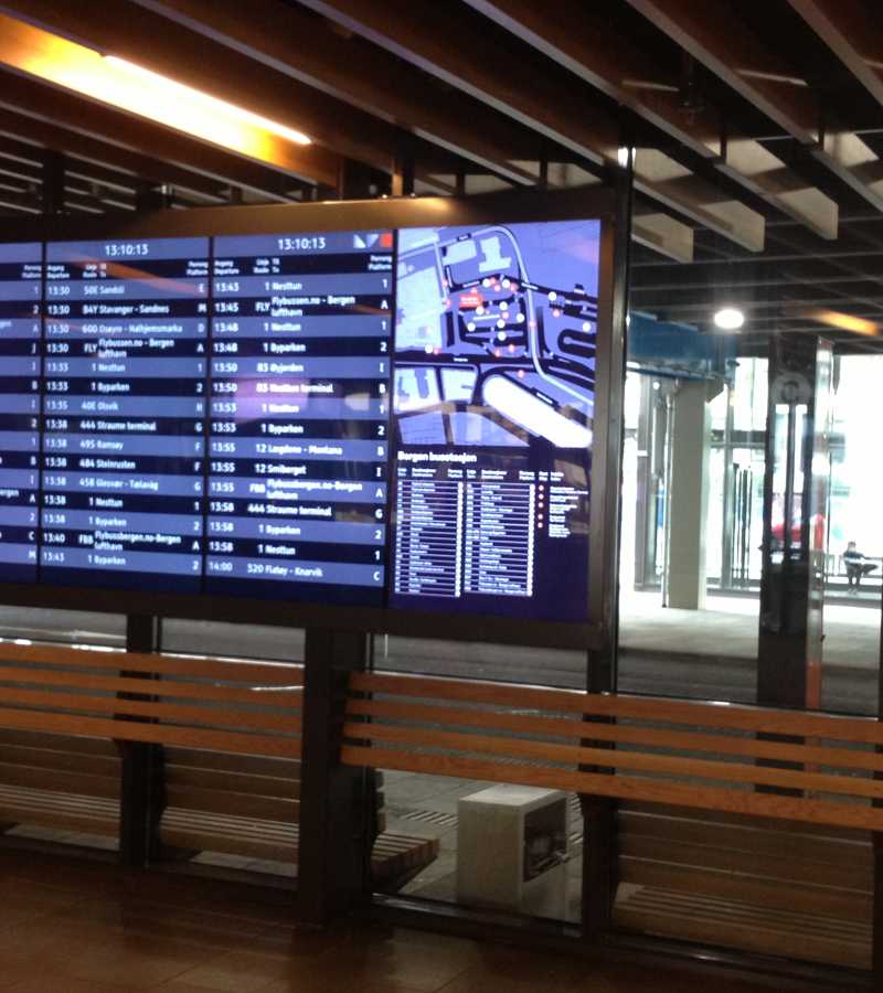 arrival and departure information on digital screens in train station