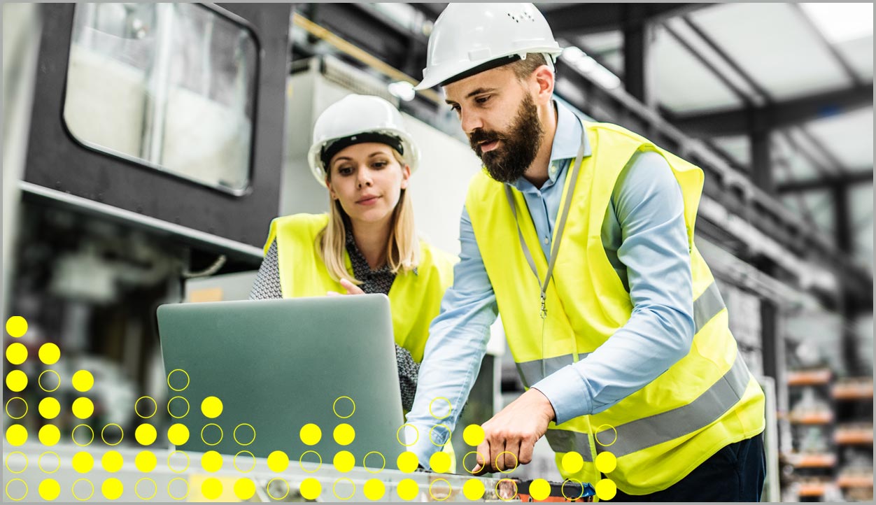 workers looking at computer screen