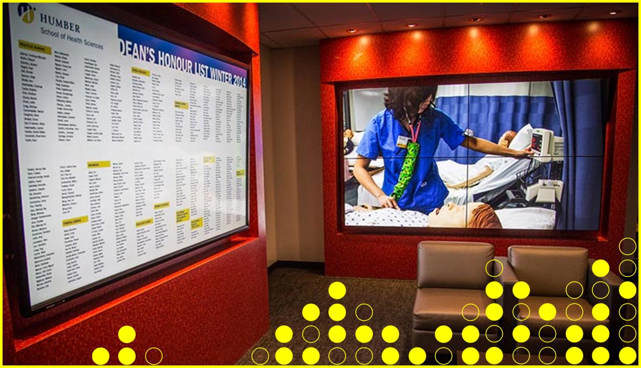 digital screens in education facility lobby