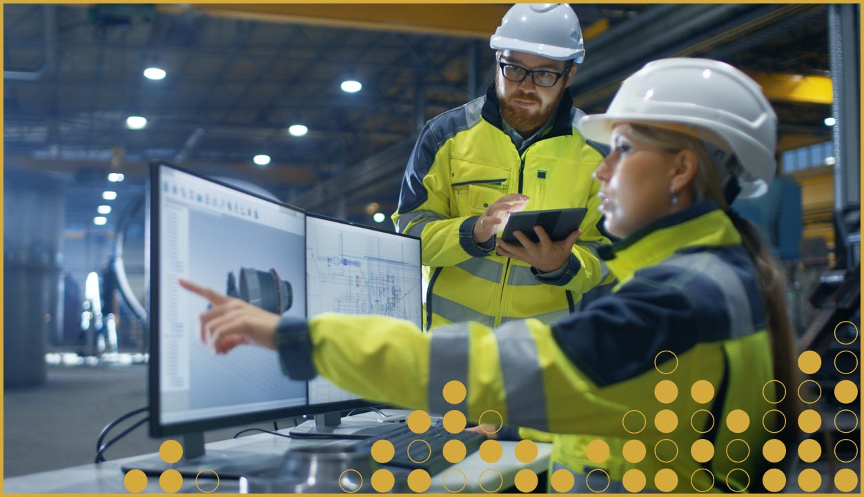 workers looking at digital screen