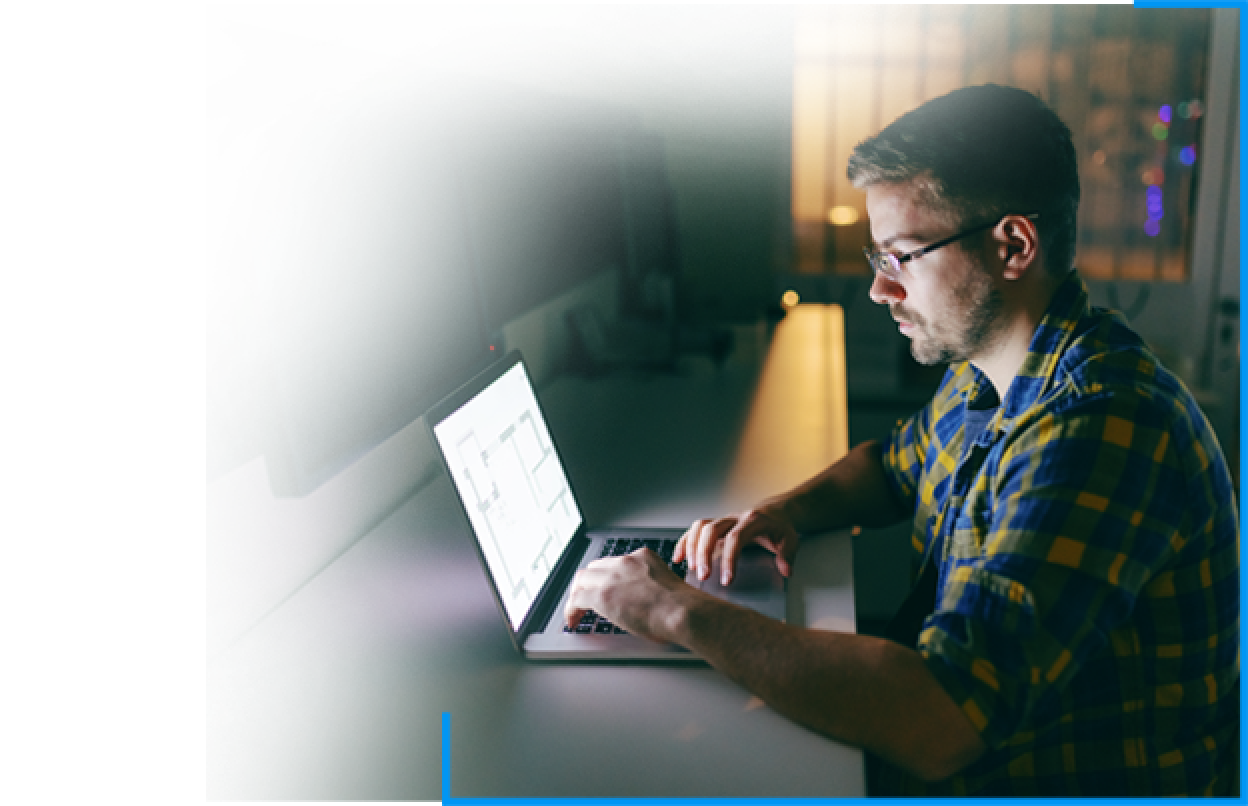 man looking at laptop