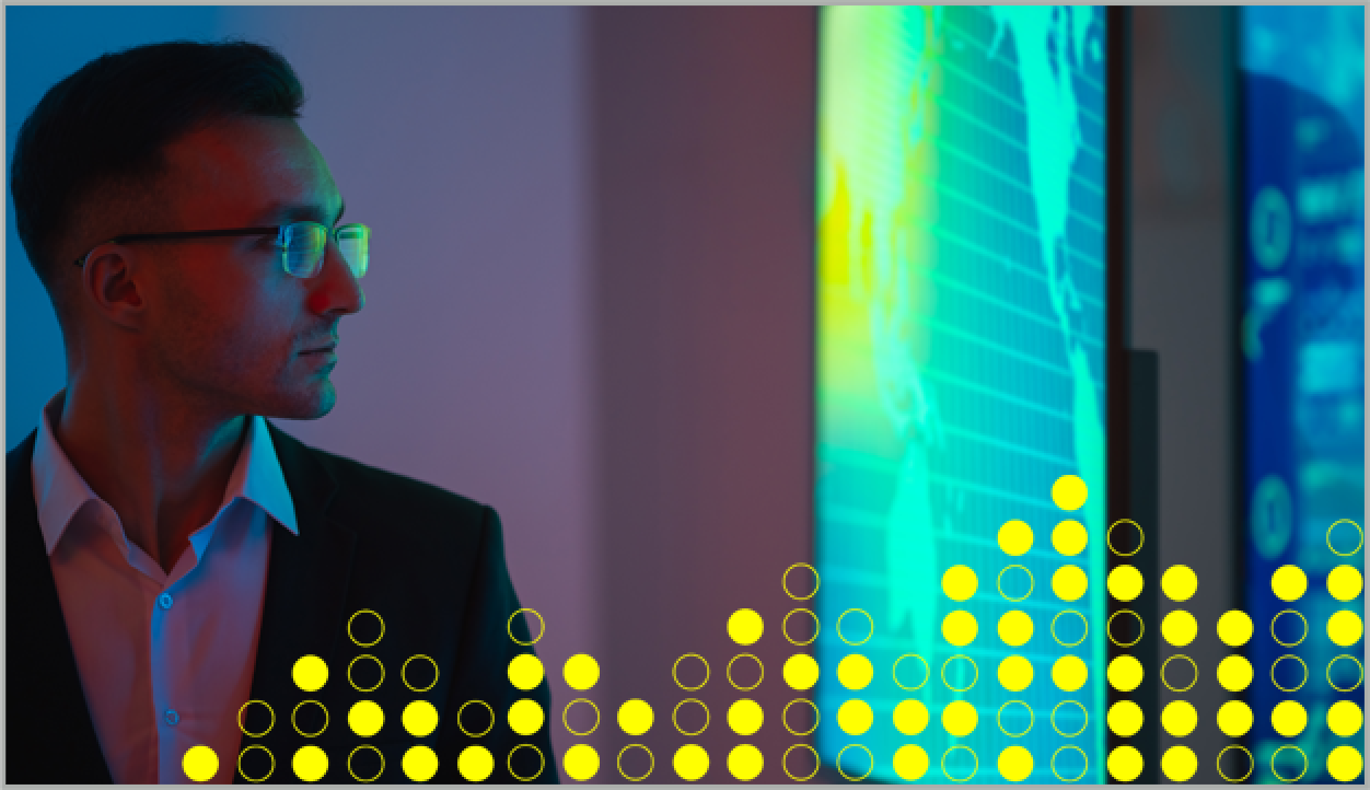 man looking at digital screen