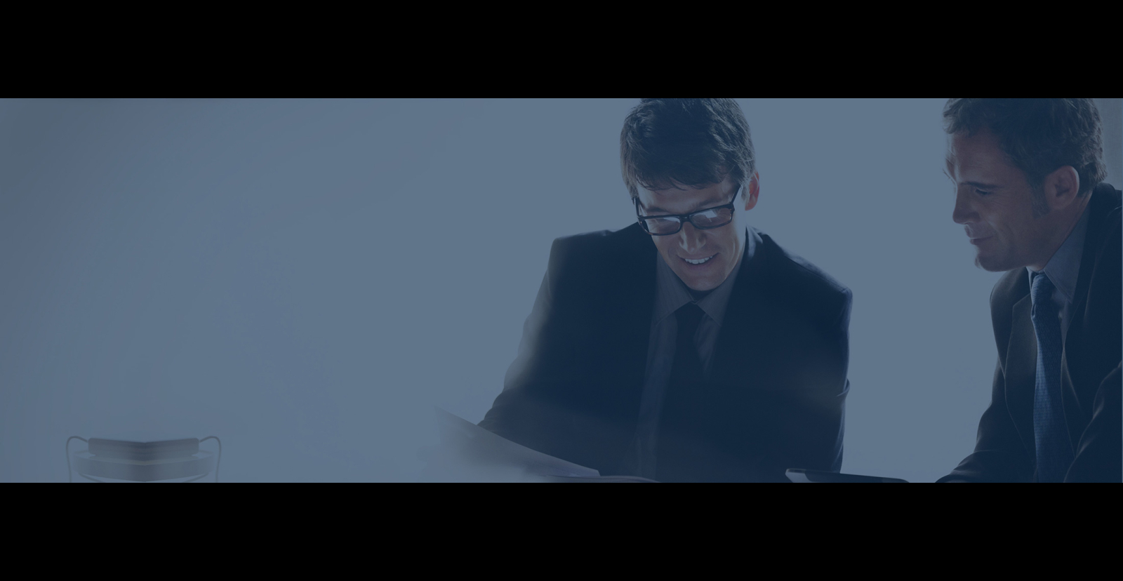Two business people looking at documents