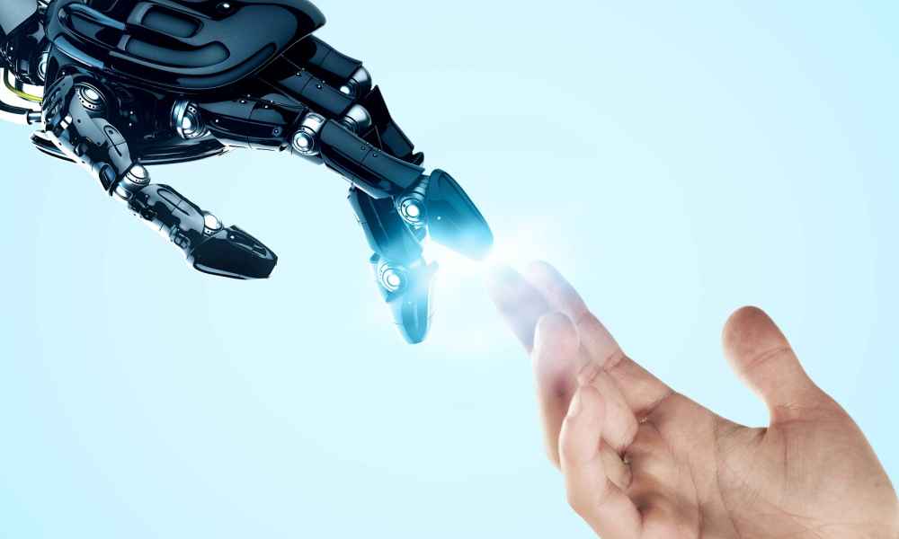 robot hand touching human hand