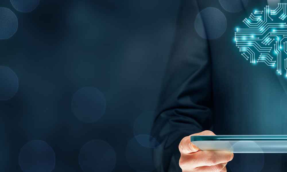 guy holding tablet with graphic of brain coming out of it