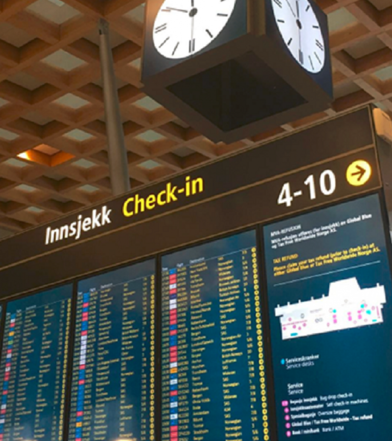 Digital screens with arrival and departure information in airport