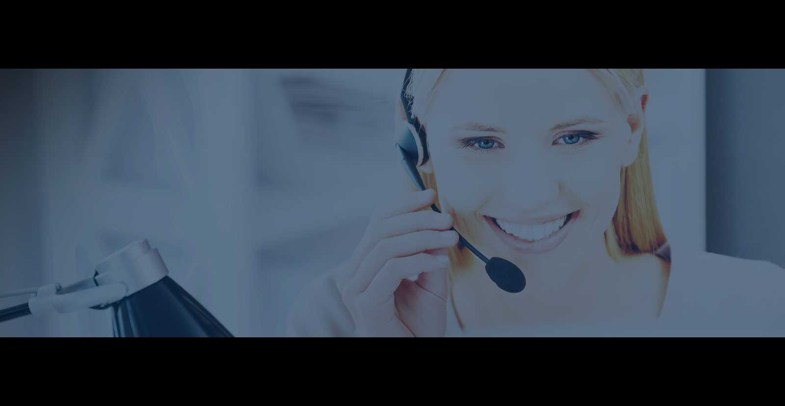 Smiling woman wearing a headset and answering a call. 